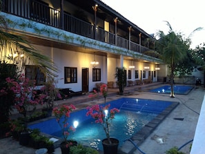 Outdoor pool, open 6:30 AM to 10:00 PM, pool umbrellas, sun loungers