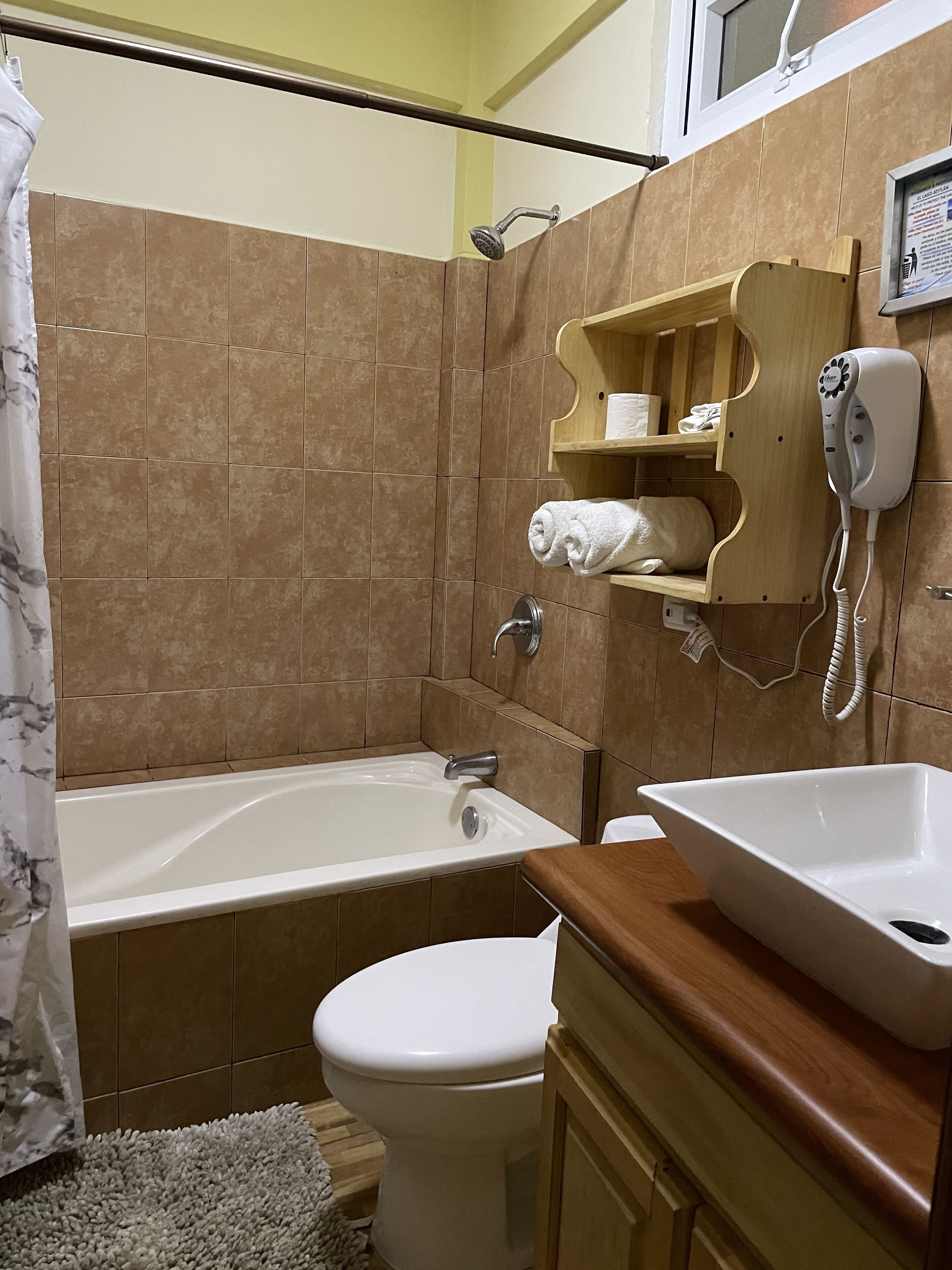deluxe room, 1 queen bed | bathroom | shower, free toiletries, hair dryer, towels