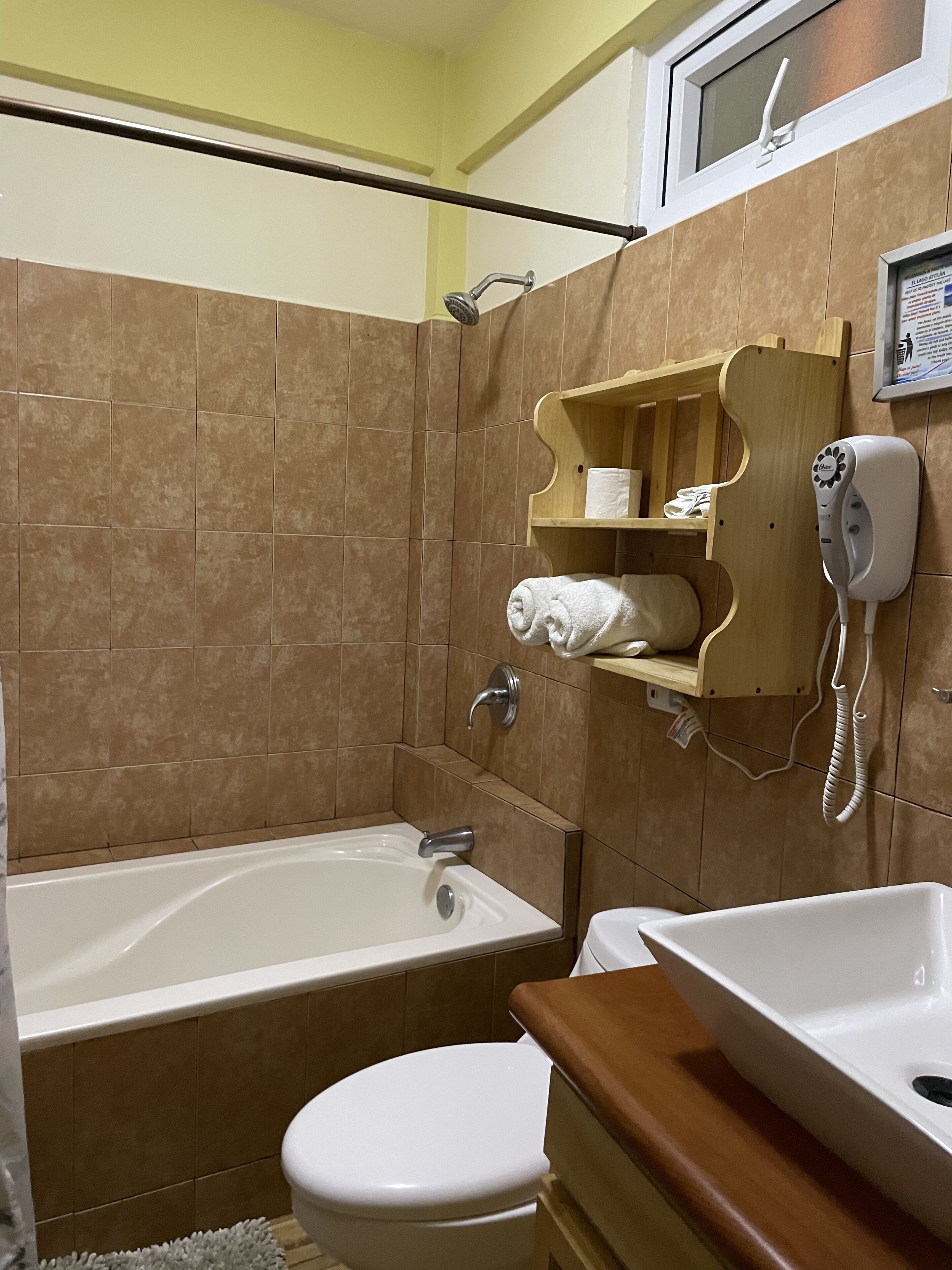 deluxe room, 1 queen bed | bathroom | shower, free toiletries, hair dryer, towels