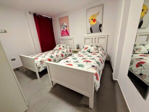2 habitaciones, tabla de planchar con plancha, wifi y ropa de cama 