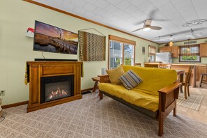 Smart TV, fireplace, books