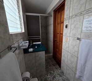 Family Double Room, 2 Single Beds, Courtyard View | Bathroom | Shower, hair dryer, towels, soap