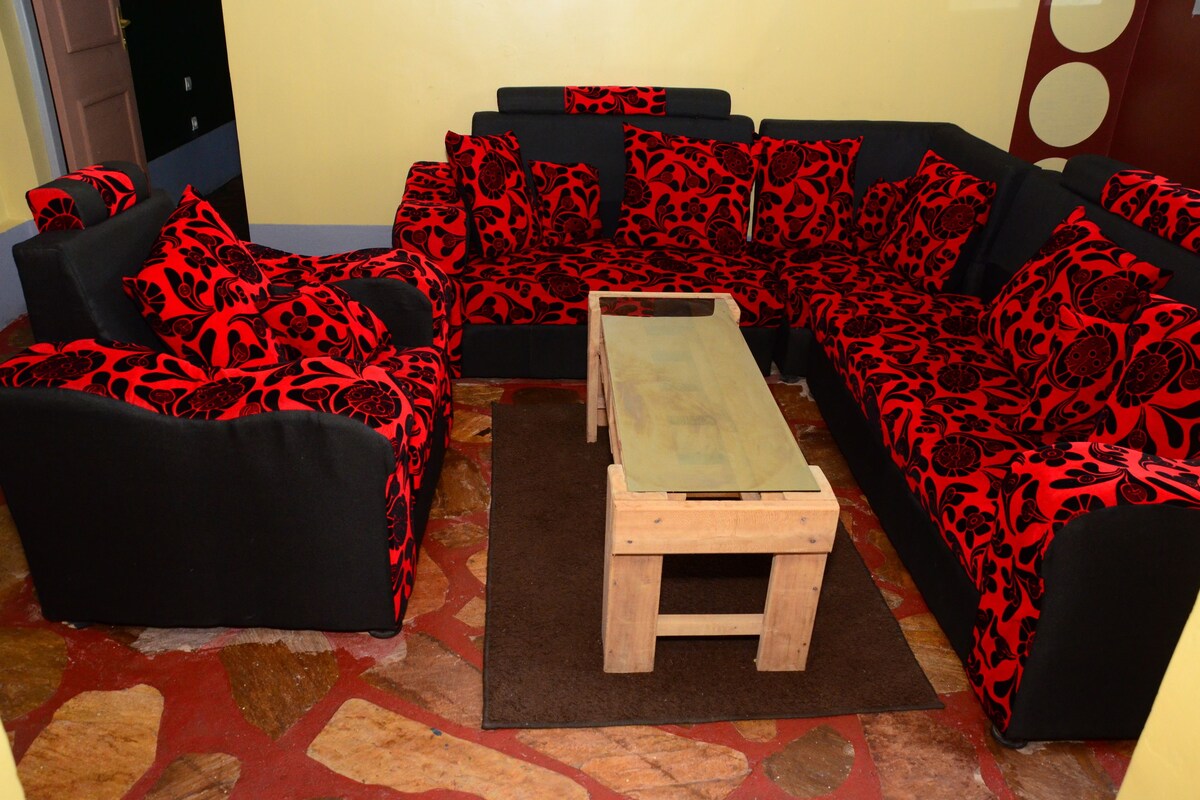 Standard Apartment, Pool View | Living room | Flat-screen TV