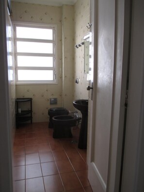 Shower, bidet, toilet paper