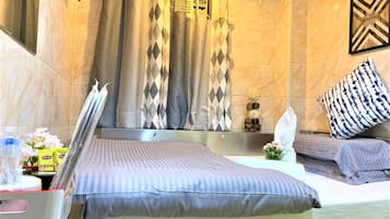 Cortinas blackout, wifi gratis y ropa de cama