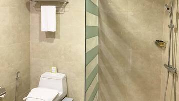 Shower, free toiletries, hair dryer, slippers