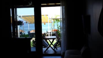 Apartment, 1 Bedroom, Sea View | Living area | LCD TV