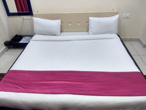Deluxe Room | Premium bedding, desk, laptop workspace, blackout curtains - Hotel Reyansh (Purnagiri)