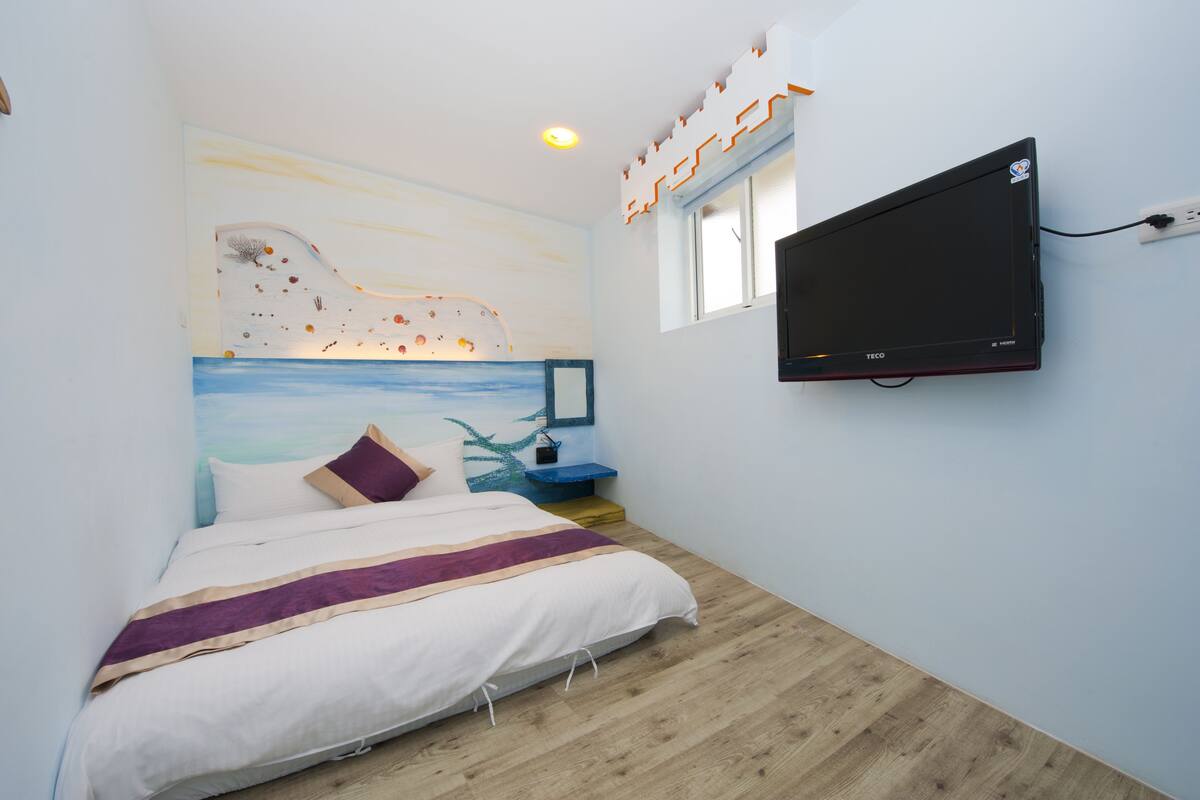 Habitación cuádruple familiar, 2 camas dobles, vistas al mar | Escritorio, sistema de insonorización, camas supletorias y wifi gratis