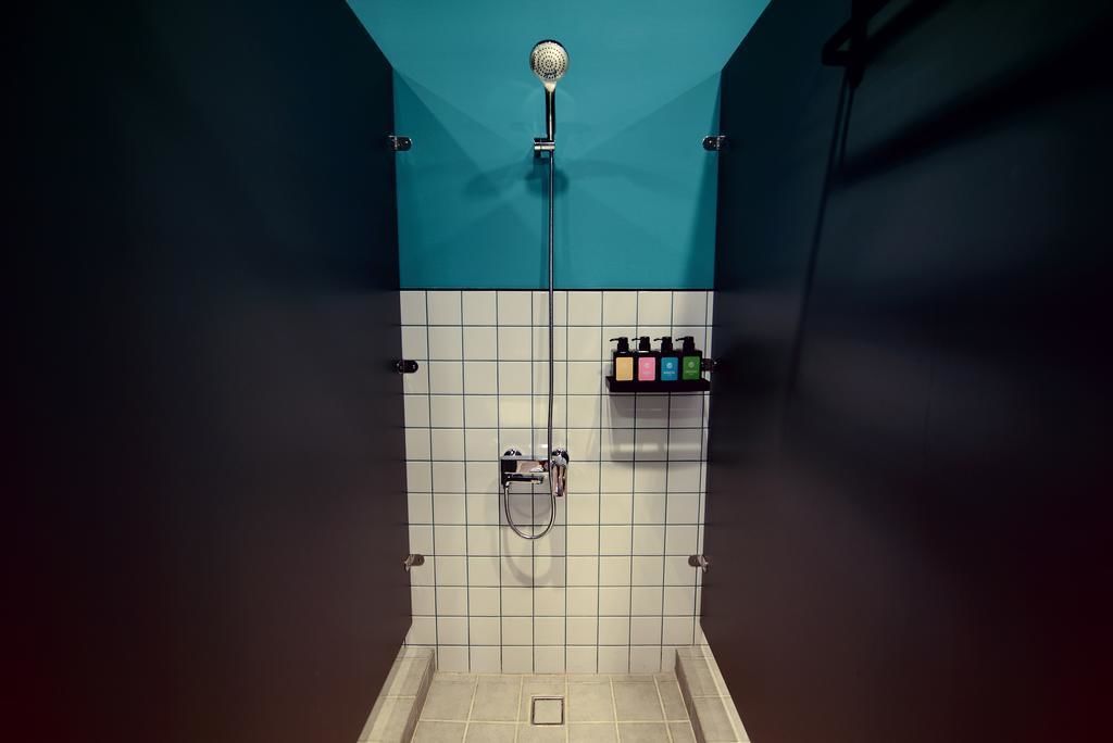 Shower, hair dryer, slippers, shampoo