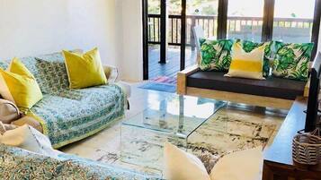 House, 4 Bedrooms | Living area | Flat-screen TV