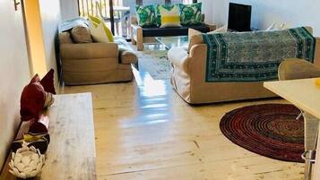 House, 4 Bedrooms | Living area | Flat-screen TV