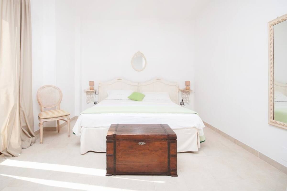 Habitación cuádruple | Ropa de cama de alta calidad y edredón