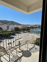 Superior Triple Room, Sea View | 1 bedroom, minibar, desk, laptop workspace