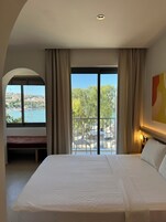 Superior Triple Room, Sea View | 1 bedroom, minibar, desk, laptop workspace