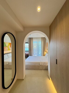 Superior Triple Room, Sea View | 1 bedroom, minibar, desk, laptop workspace