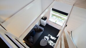 Rom – deluxe, kjøleskap | Oppholdsområde