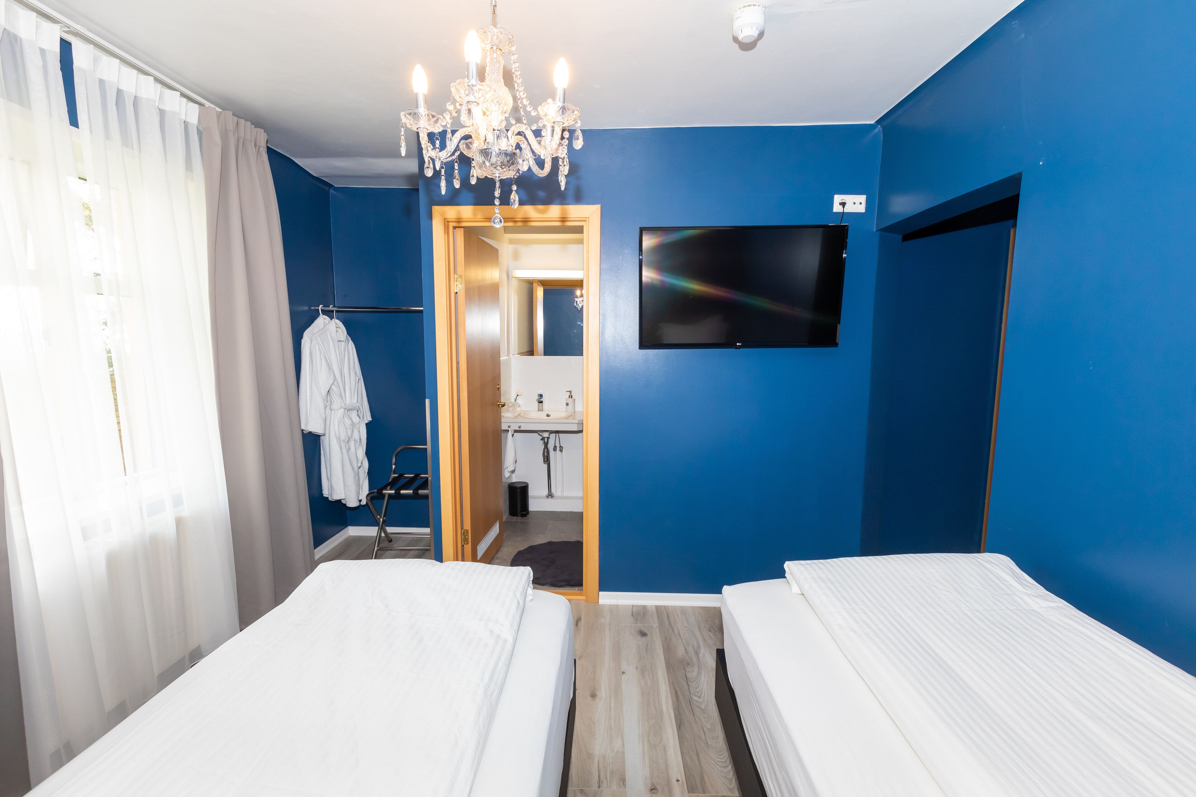 standard room, garden view | individually decorated, individually furnished, desk, blackout curtains