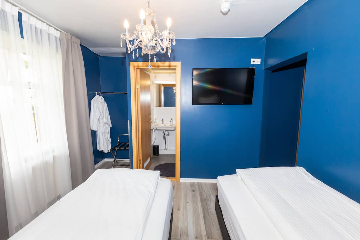 standard room, garden view | individually decorated, individually furnished, desk, blackout curtains