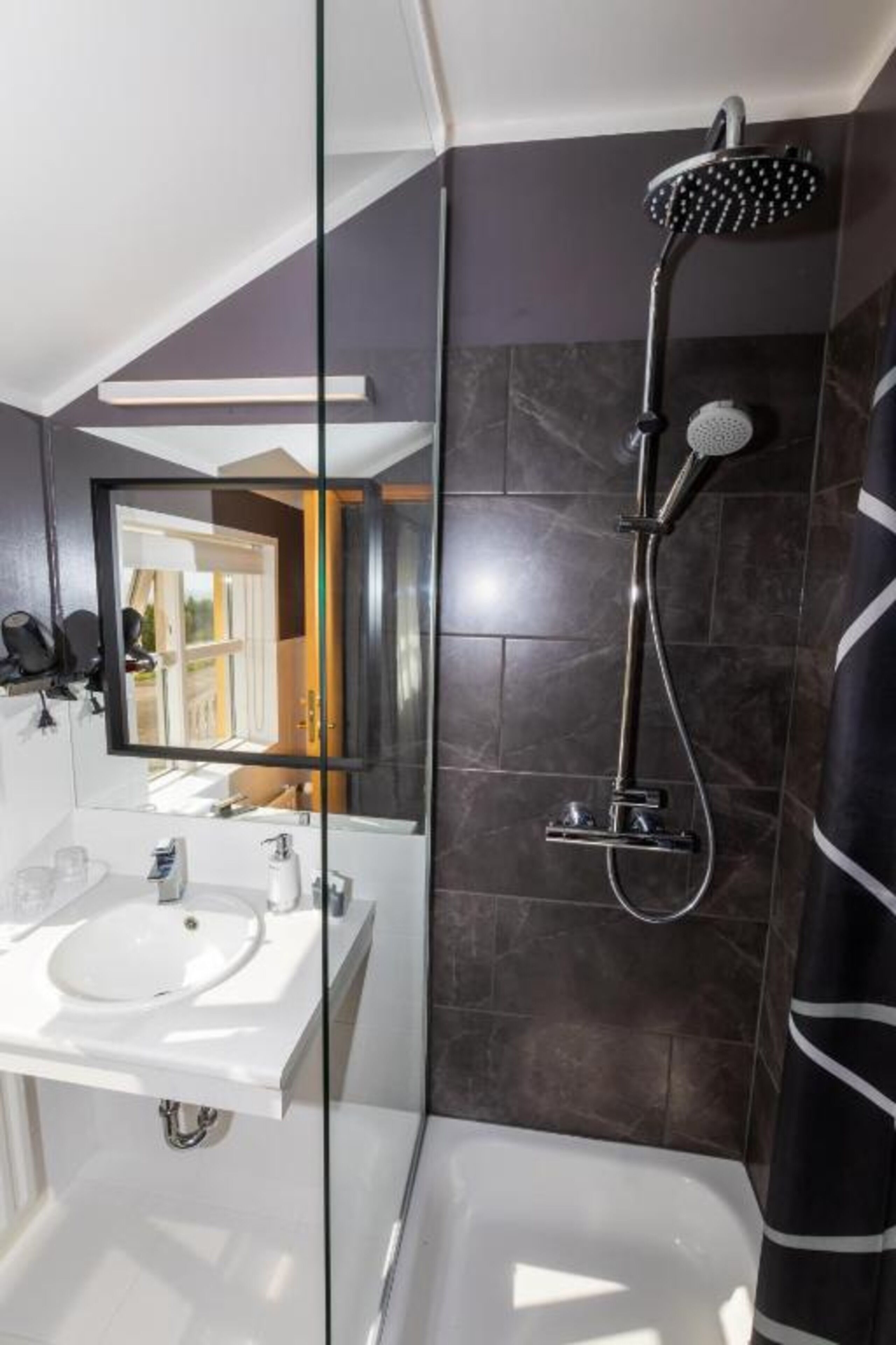 family room | bathroom | shower, free toiletries, hair dryer, bathrobes