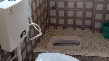 Executive Triple Room, 1 Bedroom | Bathroom | Shower, rainfall showerhead, towels, soap