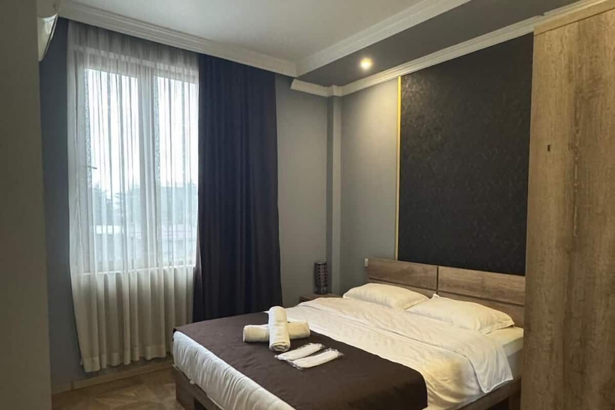 1 habitación, ropa de cama de alta calidad y minibar
