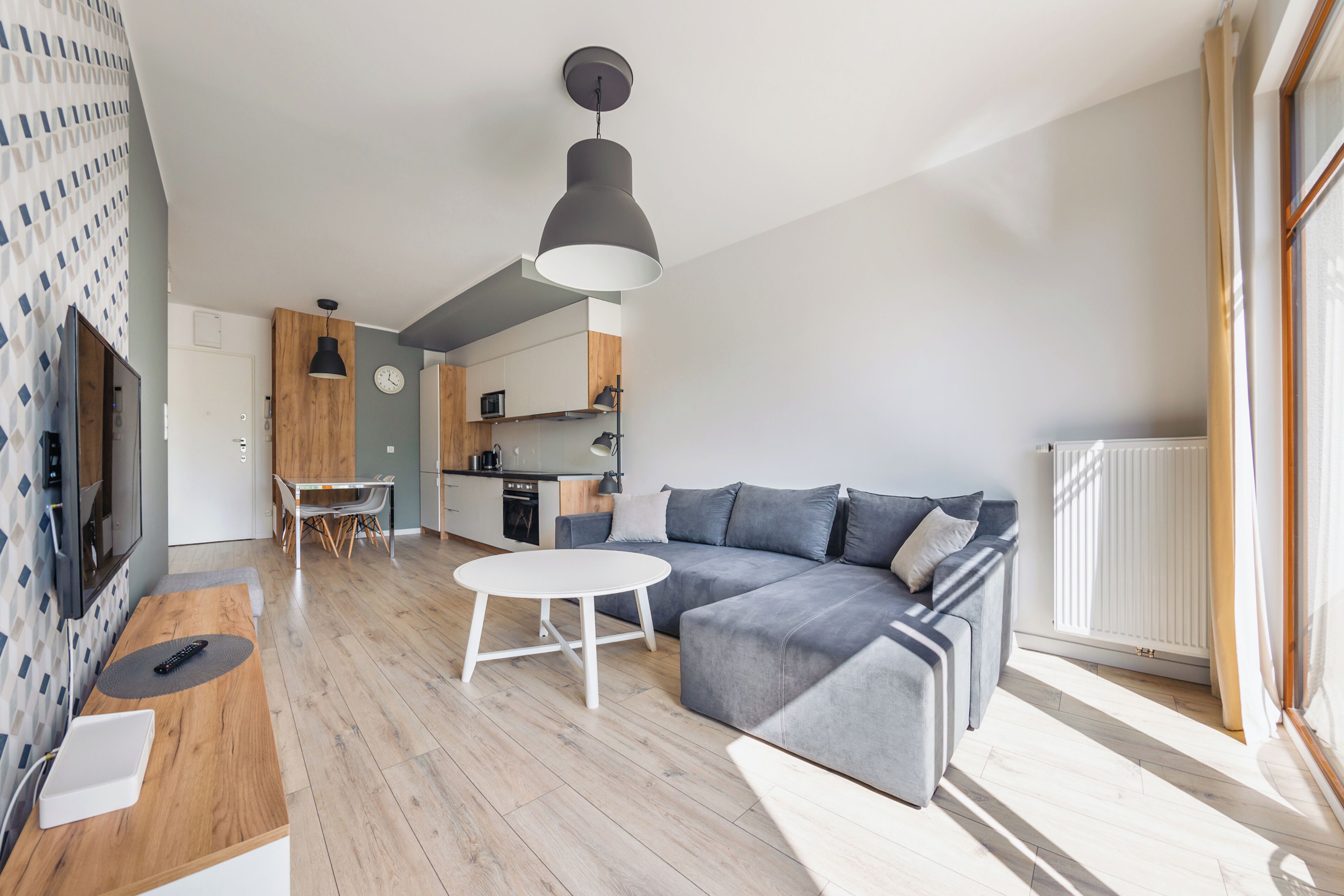 Apartment (55L/15) | Wohnbereich | Flachbildfernseher