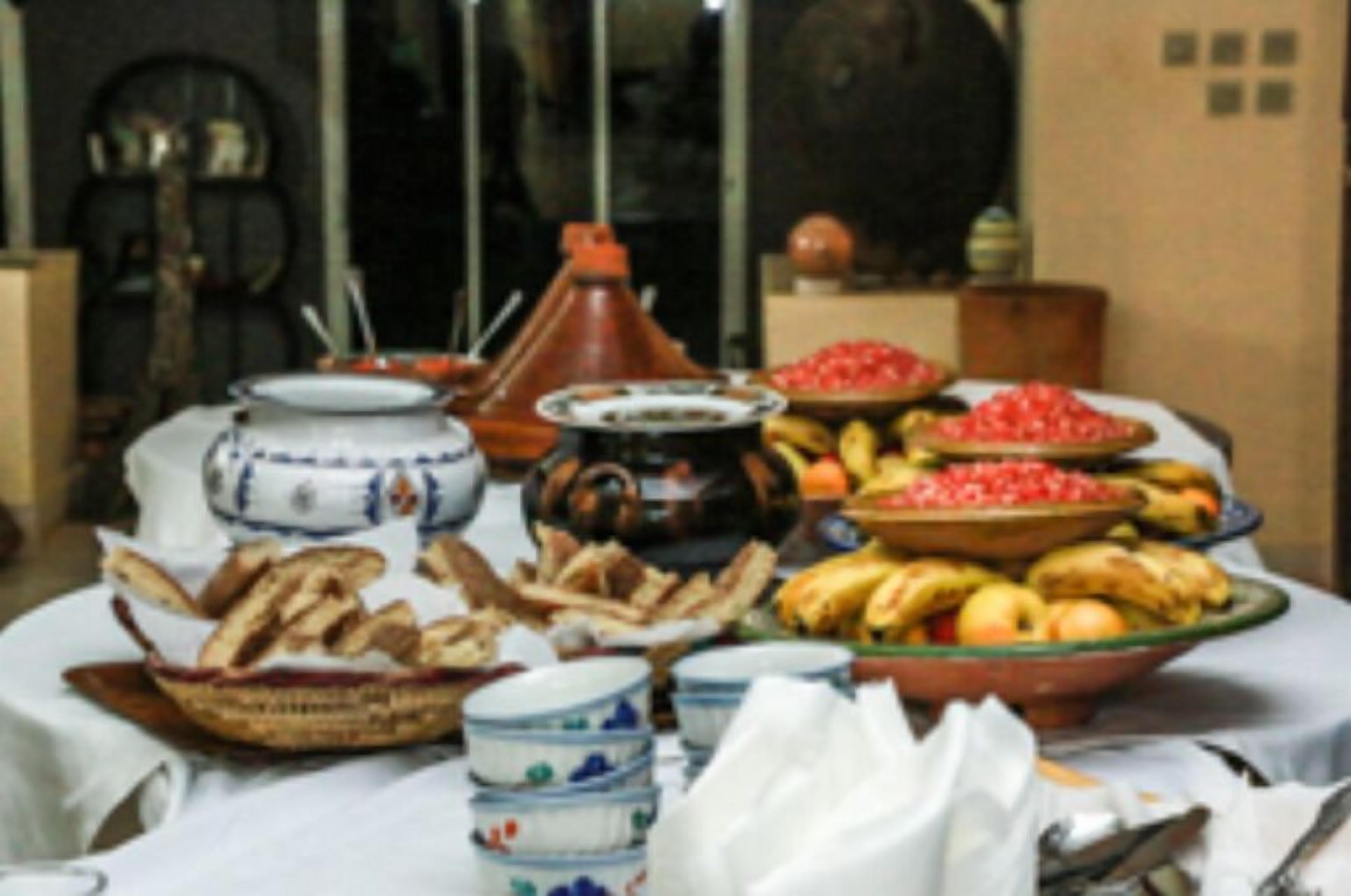 Breakfast, lunch, dinner served; local cuisine 