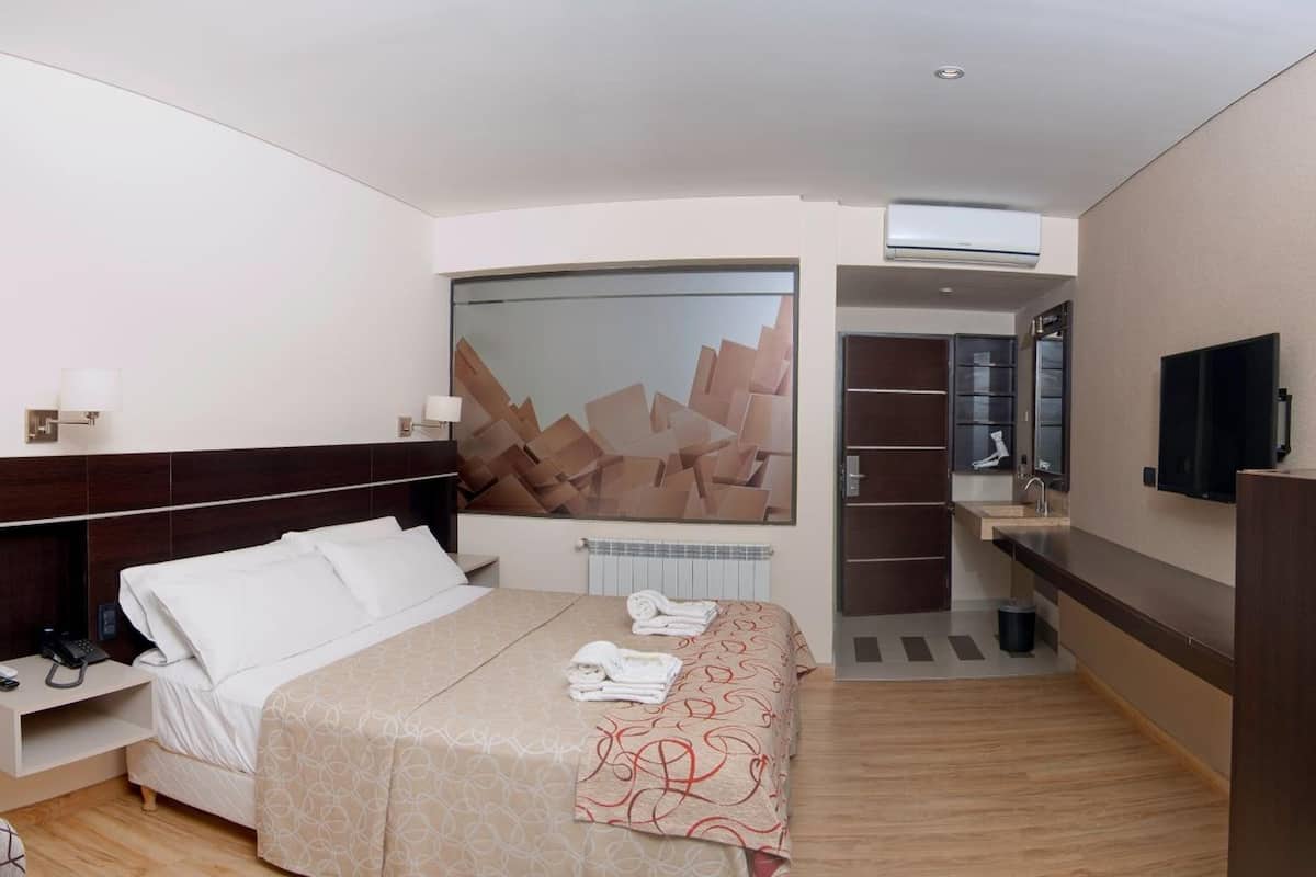 free minibar items, in-room safe, blackout curtains, iron/ironing board