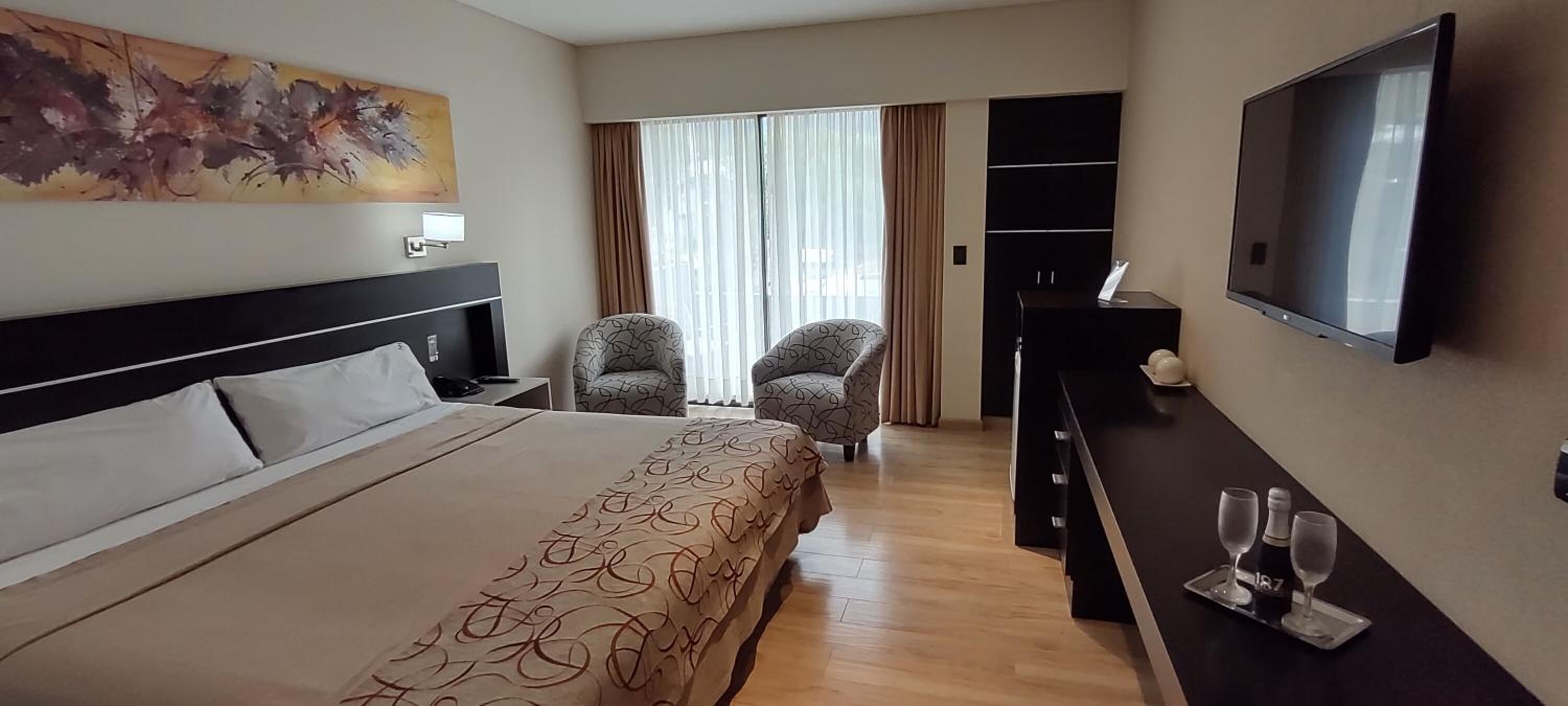 free minibar items, in-room safe, blackout curtains, iron/ironing board