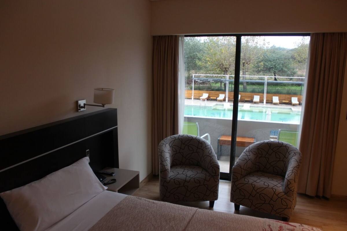 Superior Triple Room | Minibar (some free items), in-room safe, blackout drapes