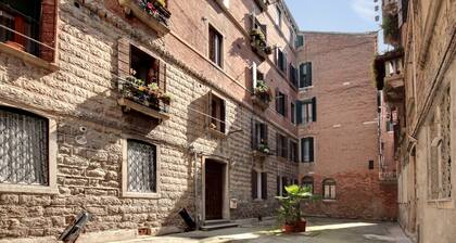 White Flowers with Canal View by Wonderful Italy