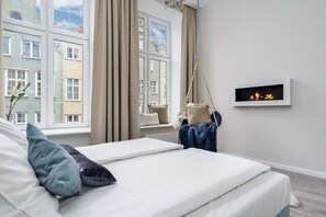Appartement Deluxe | Fer et planche à repasser, accès au Wi-Fi (inclus), literie fournie
