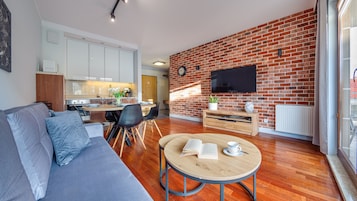 Apartament (50 C) | Living area | Flat-screen TV, table tennis