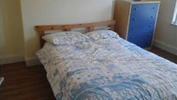 Family House | Blackout drapes, iron/ironing board, bed sheets