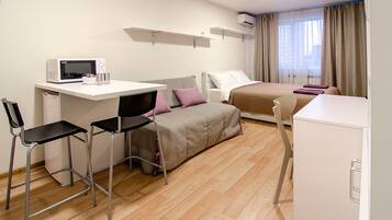 Standard Quadruple Room | Blackout curtains, soundproofing, iron/ironing board, free WiFi
