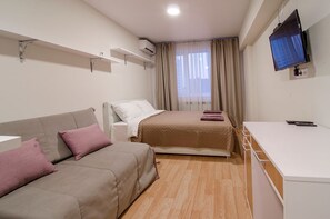 Standard Quadruple Room | Blackout drapes, soundproofing, iron/ironing board, free WiFi - Smart Apart Hotel (Kyiv)