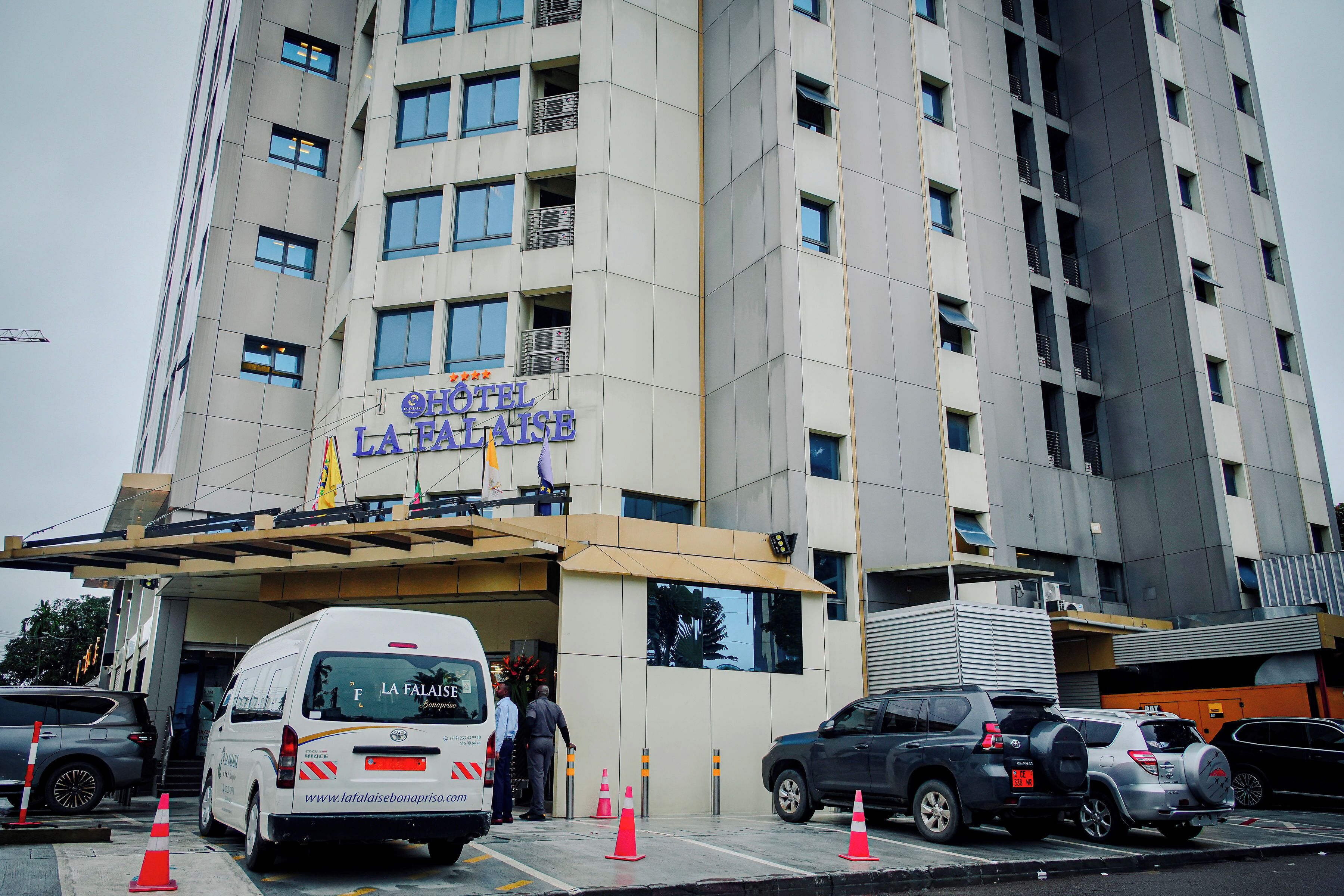 A hotel with a modern facade, multiple windows, and a sign indicating it is the Hotel La Faïle.