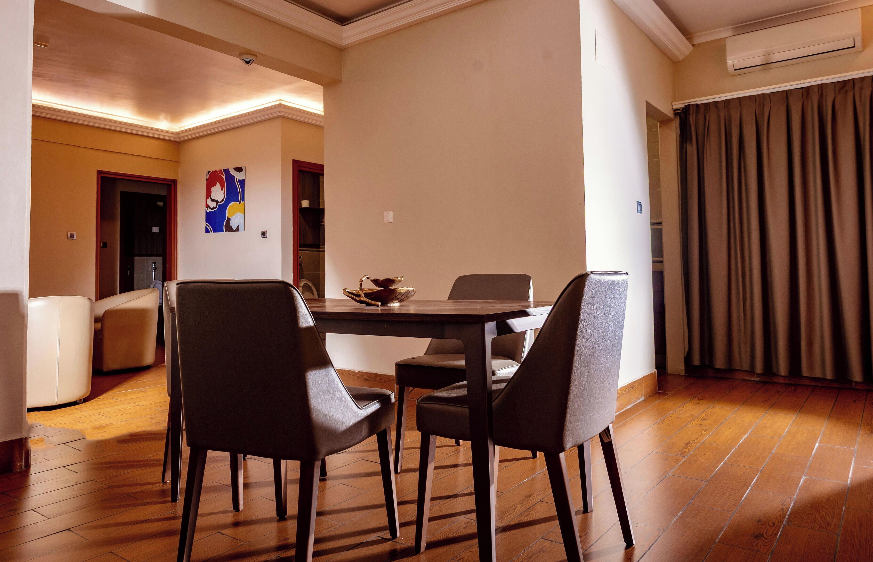 Executive Apartment, 2 Bedrooms | Living area | 32-inch flat-screen TV with satellite channels, TV