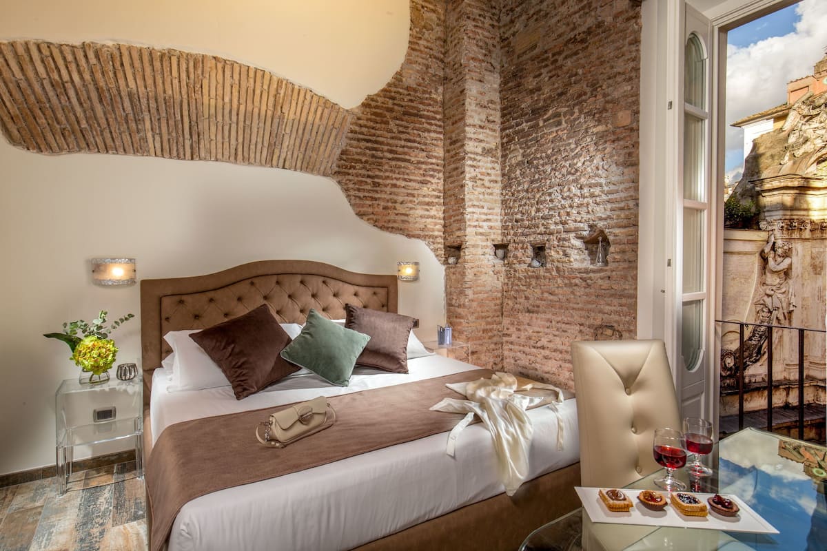 Premium bedding, down duvets, in-room safe, individually decorated