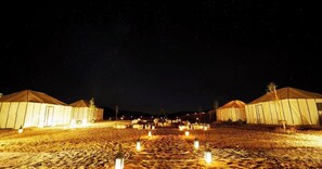 A series of tents with a clear night sky. - Merzouga Experience Camp (Taouz)
