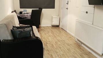 Comfort Studio Suite | Living area | Smart TV