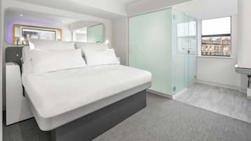 Premium bedding, memory-foam beds, in-room safe, blackout curtains