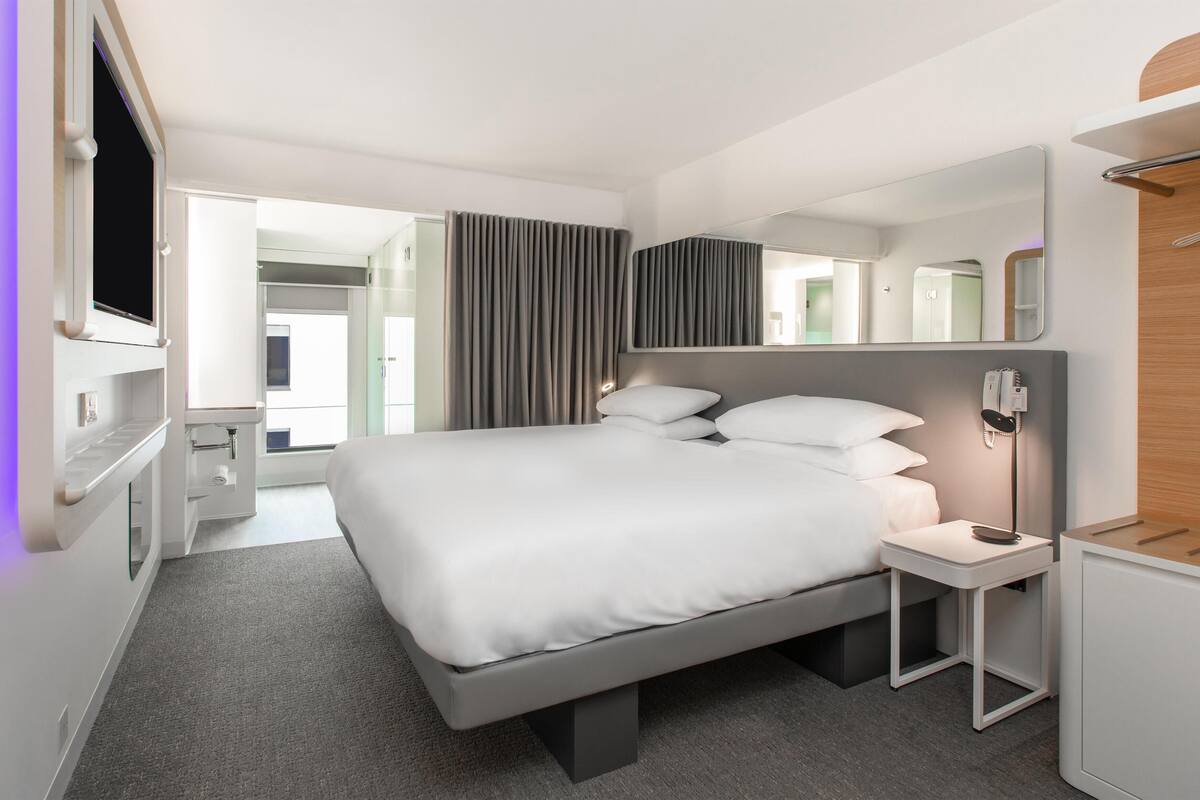 Premium bedding, memory-foam beds, in-room safe, blackout curtains