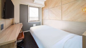 A hotel room with a bed, a desk, a chair, a television, a window, and an air conditioning unit. - Super Hotel Sakai Marittima (Sakai)