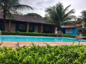 Outdoor pool, open 8:00 AM to 6:00 PM, pool loungers