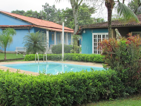 Outdoor pool, open 8:00 AM to 6:00 PM, pool loungers