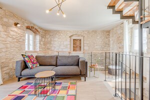 Casa Deluxe | Zona de estar | Una televisión de pantalla plana