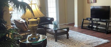 Flat-screen TV, video-game console, DVD player, iPod dock