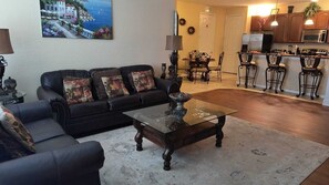 Flat-screen TV, video game console, DVD player, iPod dock